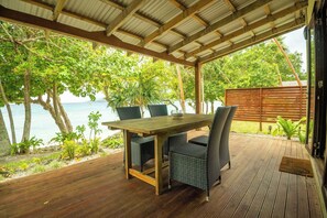 Outdoor dining - Whispering Palms Beach House - Absolute Beachfront (Siviri)