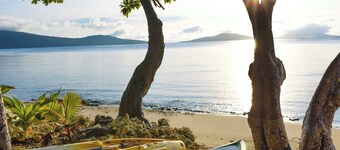 Whispering Palms Boat House - Absolute Beachfront