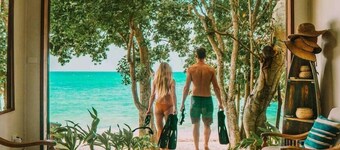 Whispering Palms Boat House - Absolute Beachfront