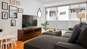 2 Bedroom Deluxe Apartment with Tri Bunk Bed | Living area | LED TV - Bayside Apartment just 5km from City Center (Port Melbourne)