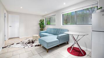 Deluxe House, 4 Bedrooms | Living area | LED TV