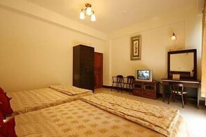 Quadruple Room (Common Bathroom) | Bathroom | Shower, free toiletries, hair dryer, slippers