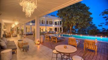 2 outdoor pools, pool umbrellas, pool loungers