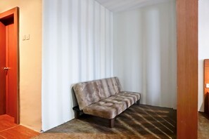 Familien-Suite | Wohnbereich | Flachbildfernseher