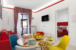 Deluxe Apartment, 1 Bedroom, Balcony | Living area | 43-inch flat-screen TV with digital channels, Smart TV - Maison Iolanda (Piano di Sorrento)