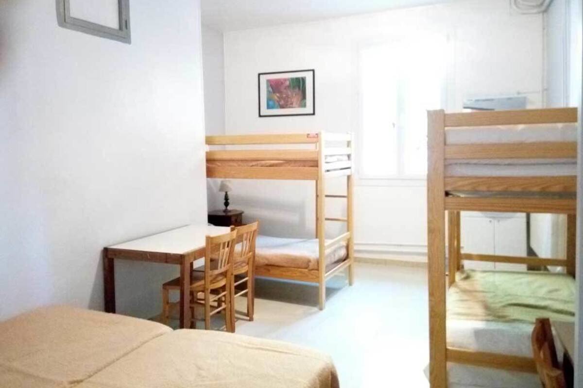 Family Room, Shared Bathroom | Cribs (free), WiFi (free), bed sheets