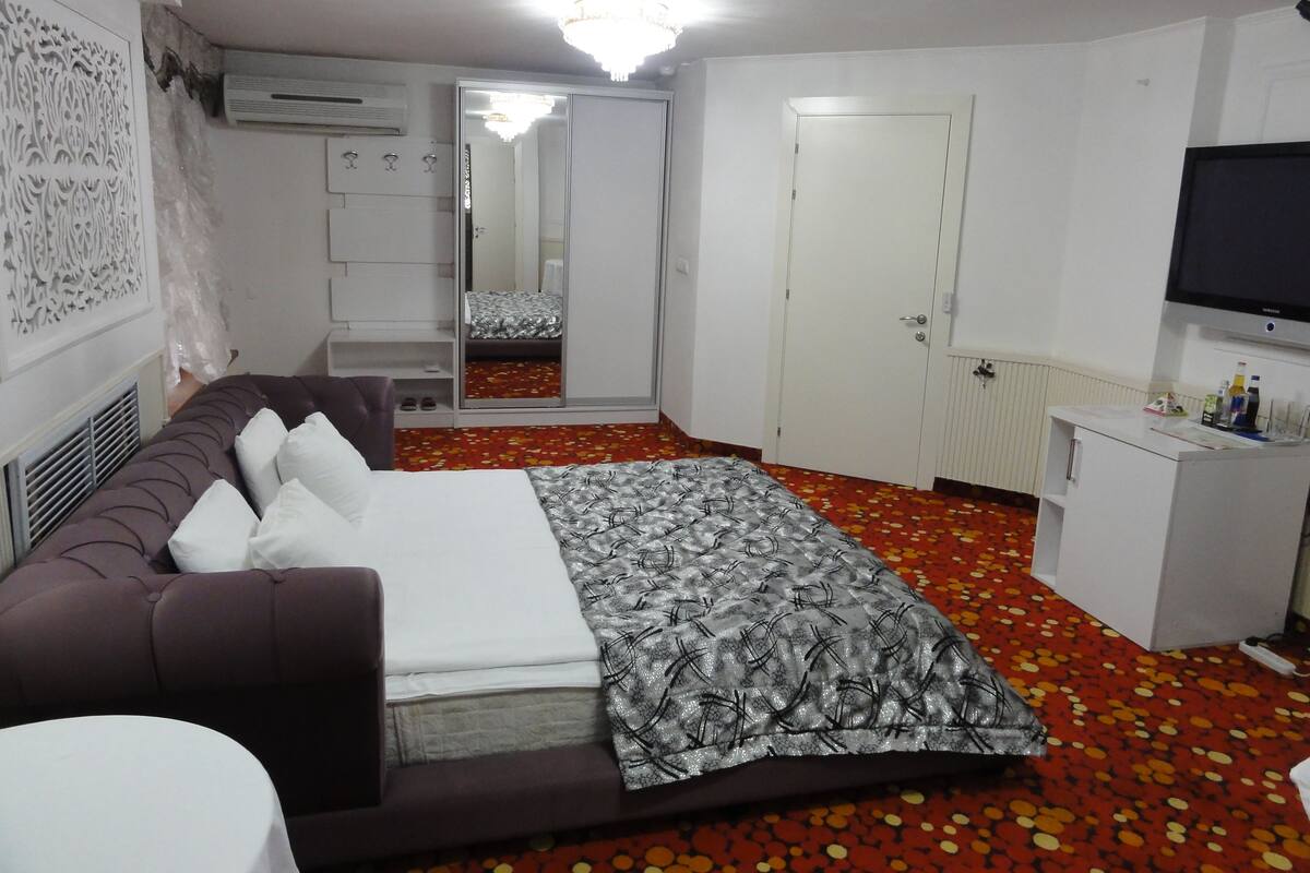 Habitación Elite, 1 cama Queen size | Sábanas de algodón egipcio y ropa de cama de alta calidad
