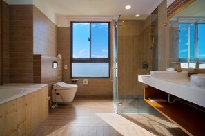 Executive Double Room, 1 King Bed, Ocean View, Tower | Bathroom | Separate tub and shower, designer toiletries, hair dryer, slippers - Sinasera Resort (Changbin)