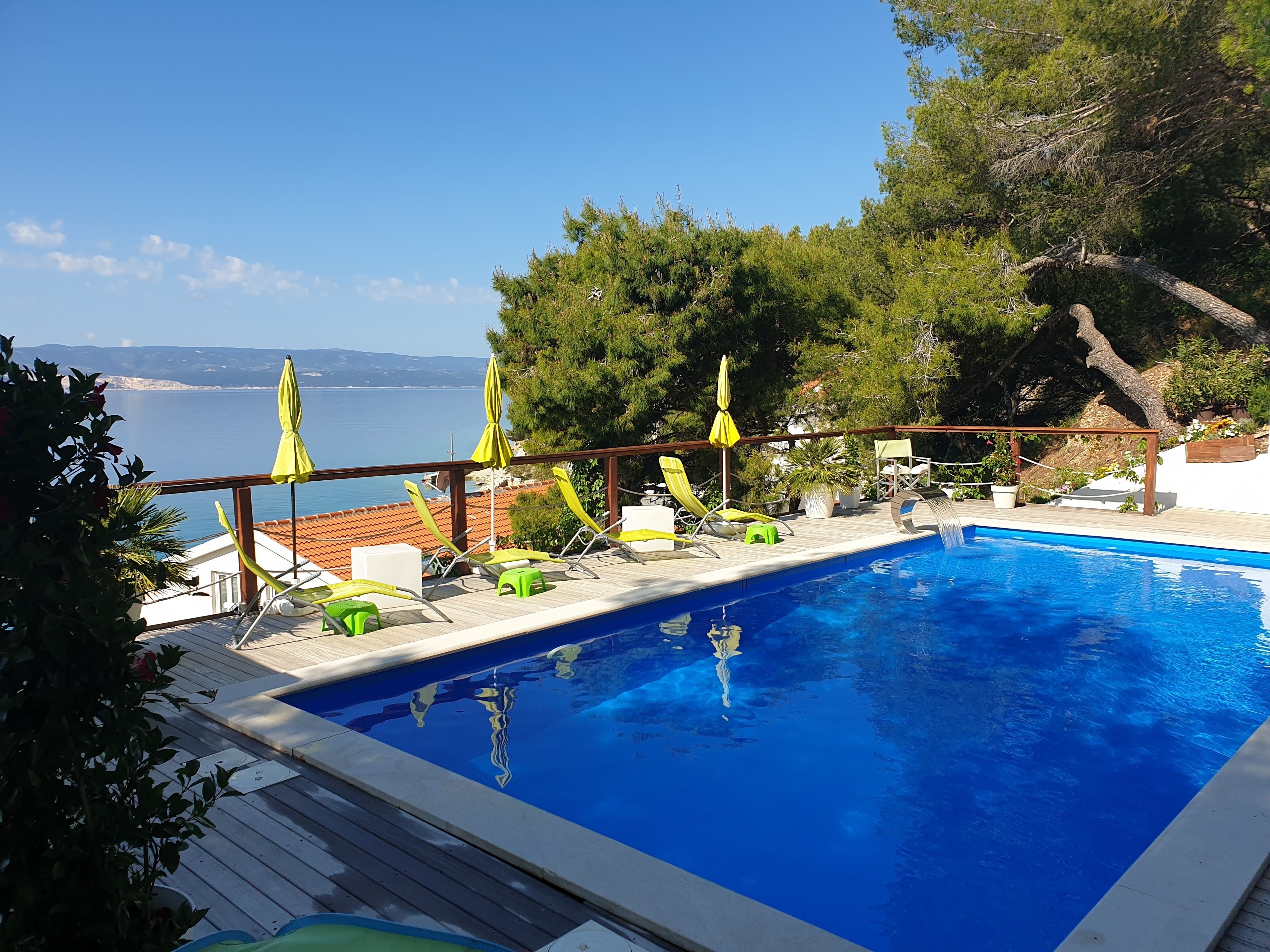 Außenpool, beheizter Pool, Sonnenschirme, Liegestühle