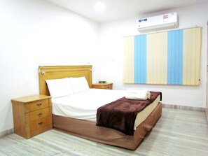 Departamento familiar, 2 habitaciones, con acceso para personas discapacitadas, planta baja | Espacio para trabajar con laptop, cortinas blackout y wifi gratis