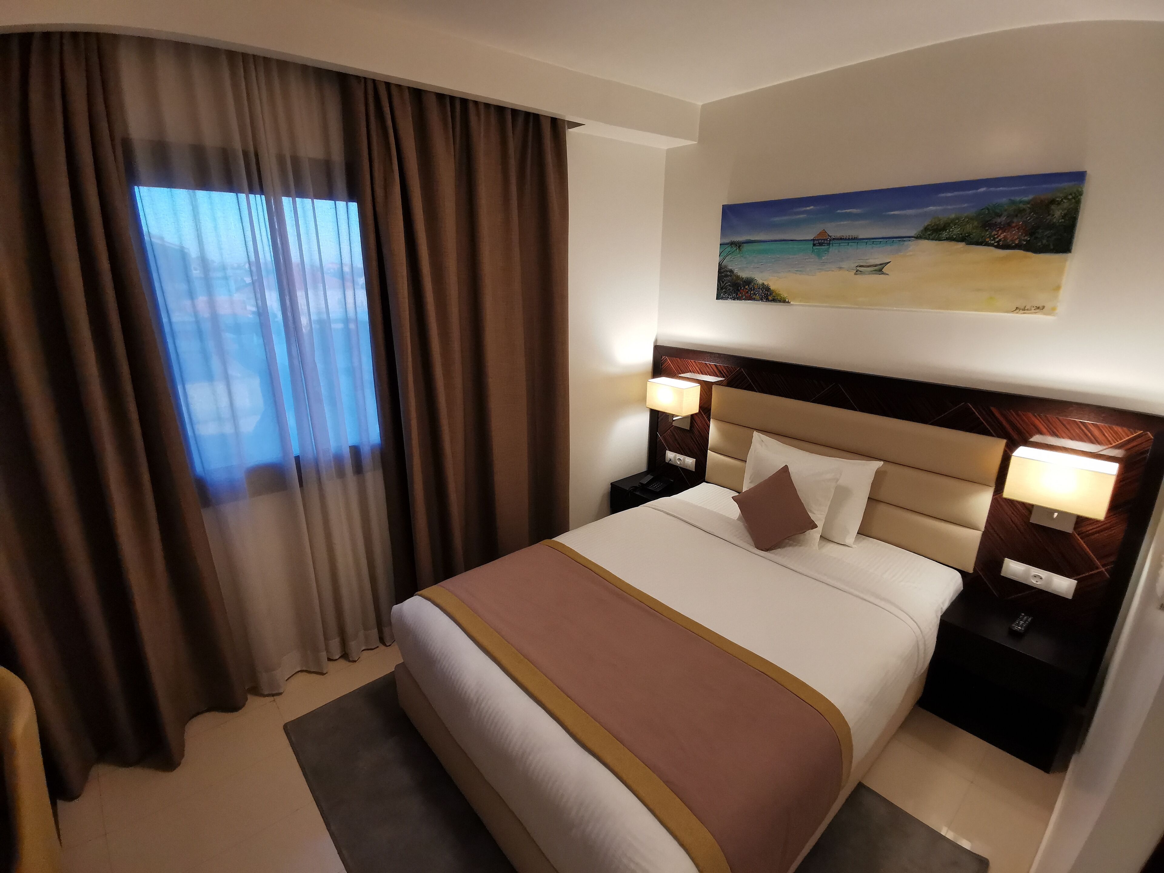 classic room | premium bedding, select comfort beds, minibar, in-room safe