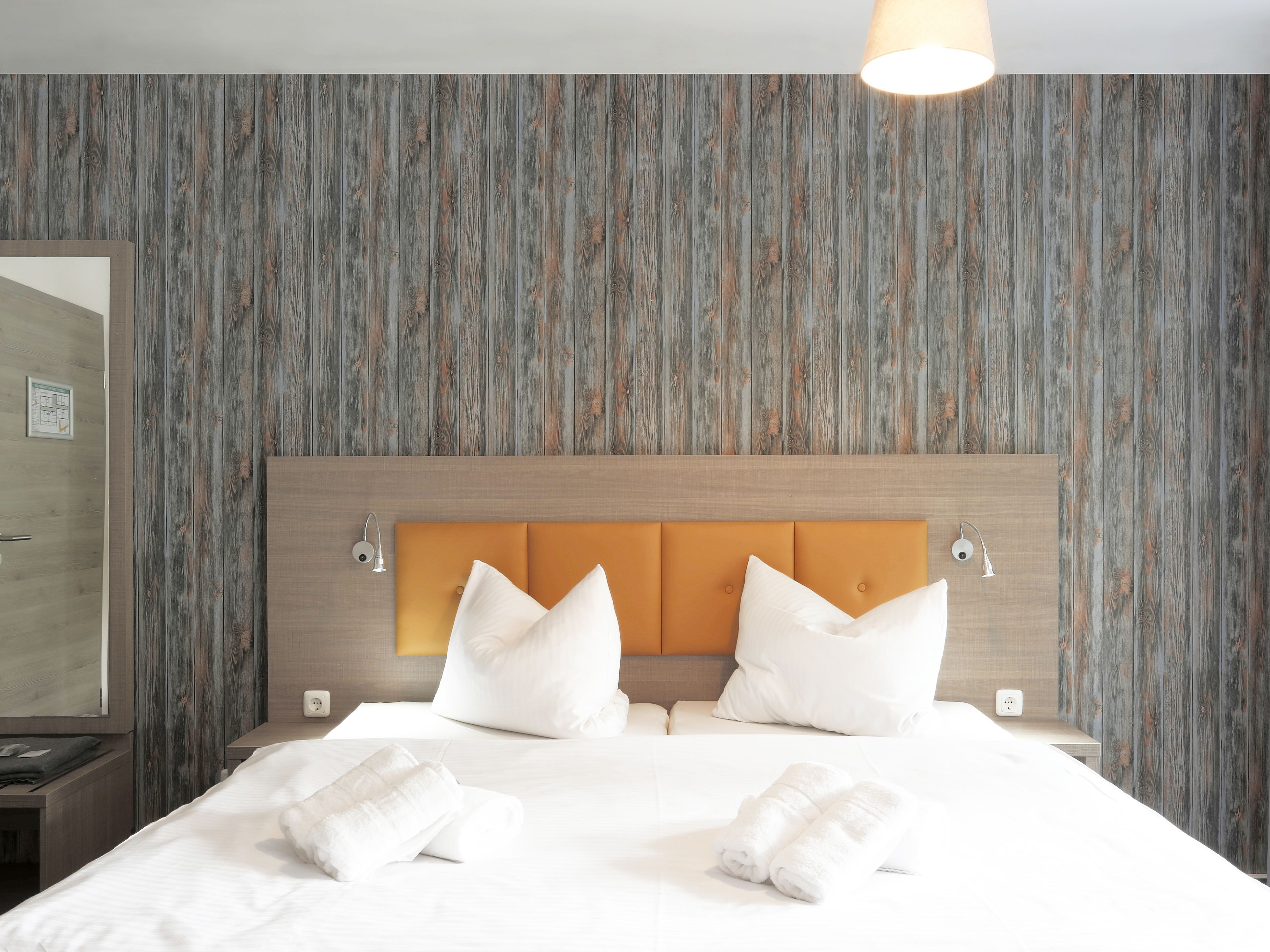 Hypo-allergenic bedding, down duvets, in-room safe, desk