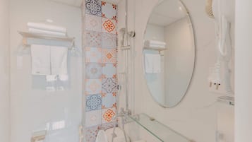 Shower, free toiletries, hair dryer, slippers