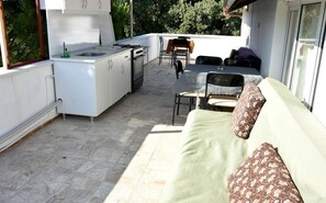 Standard Quadruple Room, Kitchenette | Private kitchenette