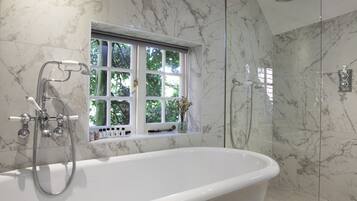 Shower, hair dryer, bathrobes, towels