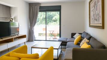 Sunny Apartments - Luxury 2BR @City Center | Living area | 55-inch flat-screen TV with satellite channels, TV, Netflix