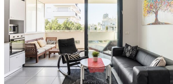 Sunny Apartments Luxury 2BR @City Centre with Balcony | Living area | 55-inch flat-screen TV with satellite channels, TV, Netflix