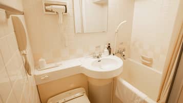 Ensemble douche/baignoire, articles de toilette gratuits, sèche-cheveux