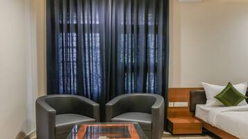 Deluxe Room | Living area | LED TV