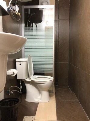 Apartment, 2 Bedrooms | Bathroom | Shower, free toiletries, hair dryer, towels