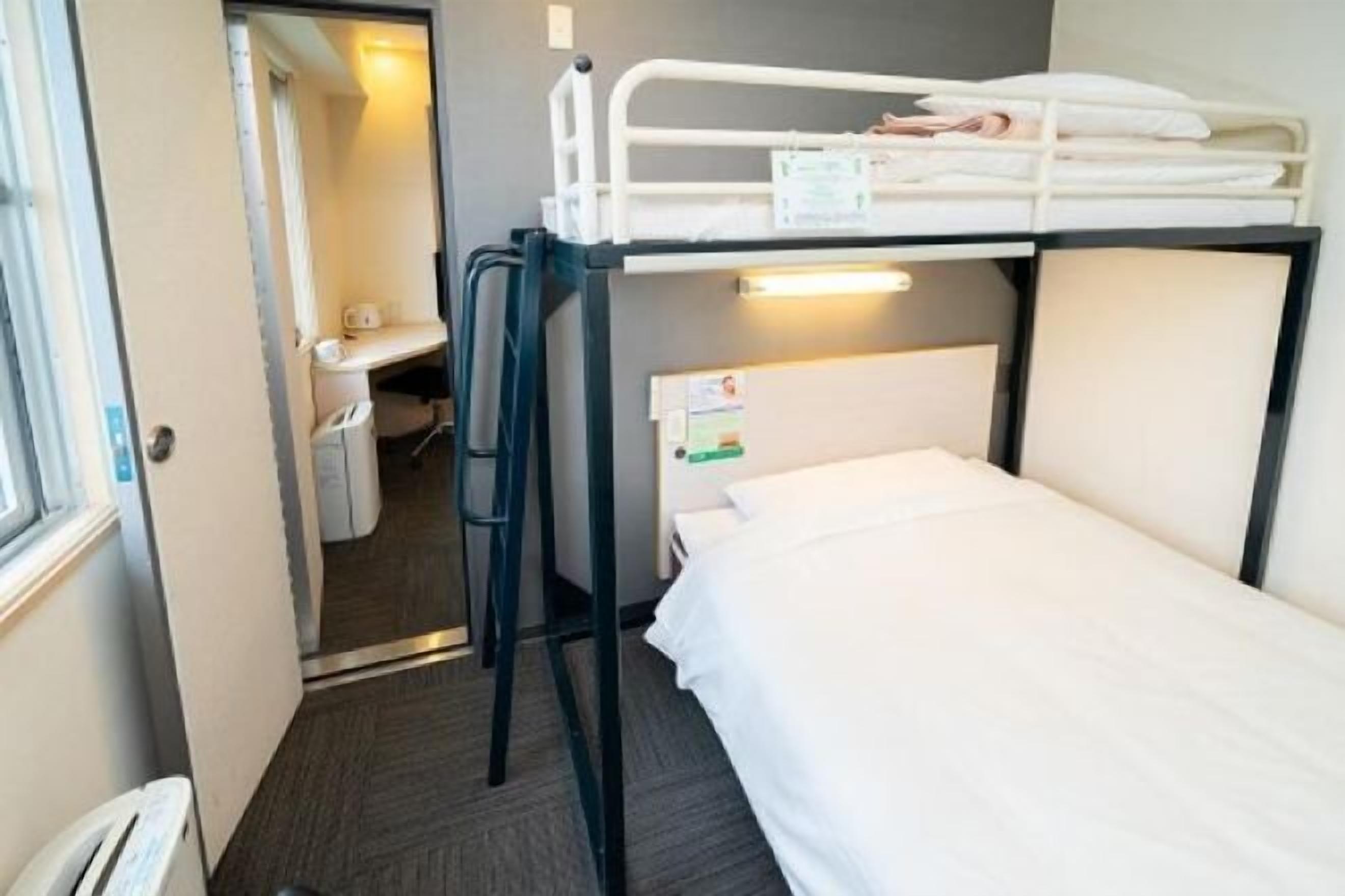 Desk, laptop workspace, blackout drapes, soundproofing