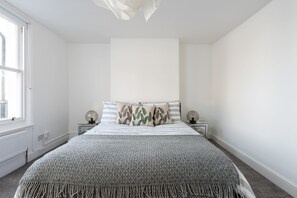 Premium bedding, memory foam beds, blackout drapes, iron/ironing board