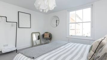Premium bedding, memory foam beds, blackout drapes, iron/ironing board