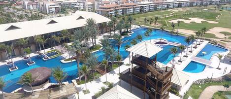 Outdoor pool, pool umbrellas, sun loungers