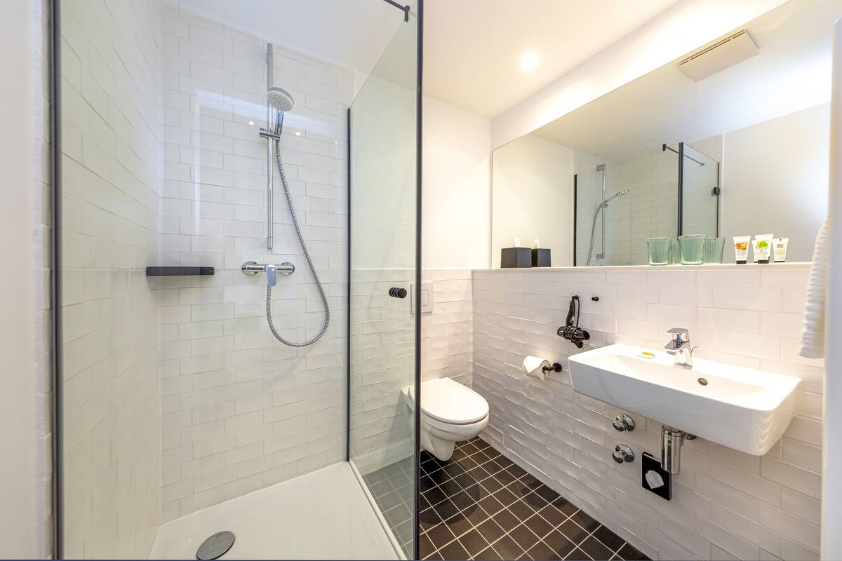 comfort double room | bathroom | shower, hair dryer, towels, soap