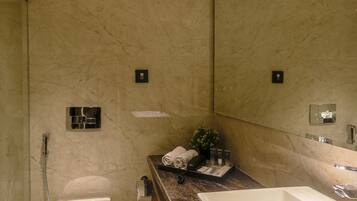 Shower, rainfall showerhead, designer toiletries, hair dryer