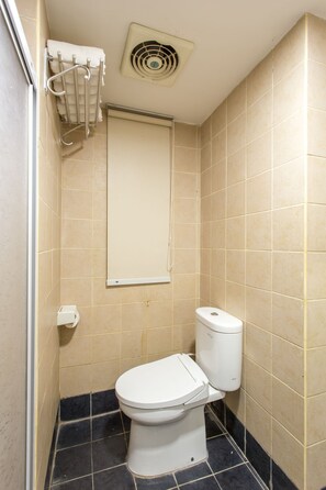 Family Suite, 2 Double Beds | Bathroom | Shower, rainfall showerhead, towels