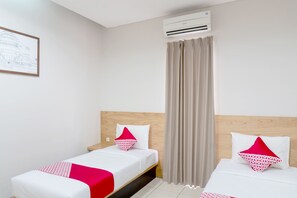 Kamar Twin Deluks, 2 Tempat Tidur Twin | Meja kerja, Wi-Fi gratis, dan seprai linen