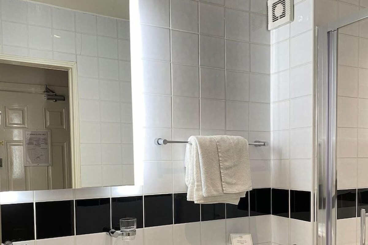 Bathroom | Shower, free toiletries, hair dryer, towels