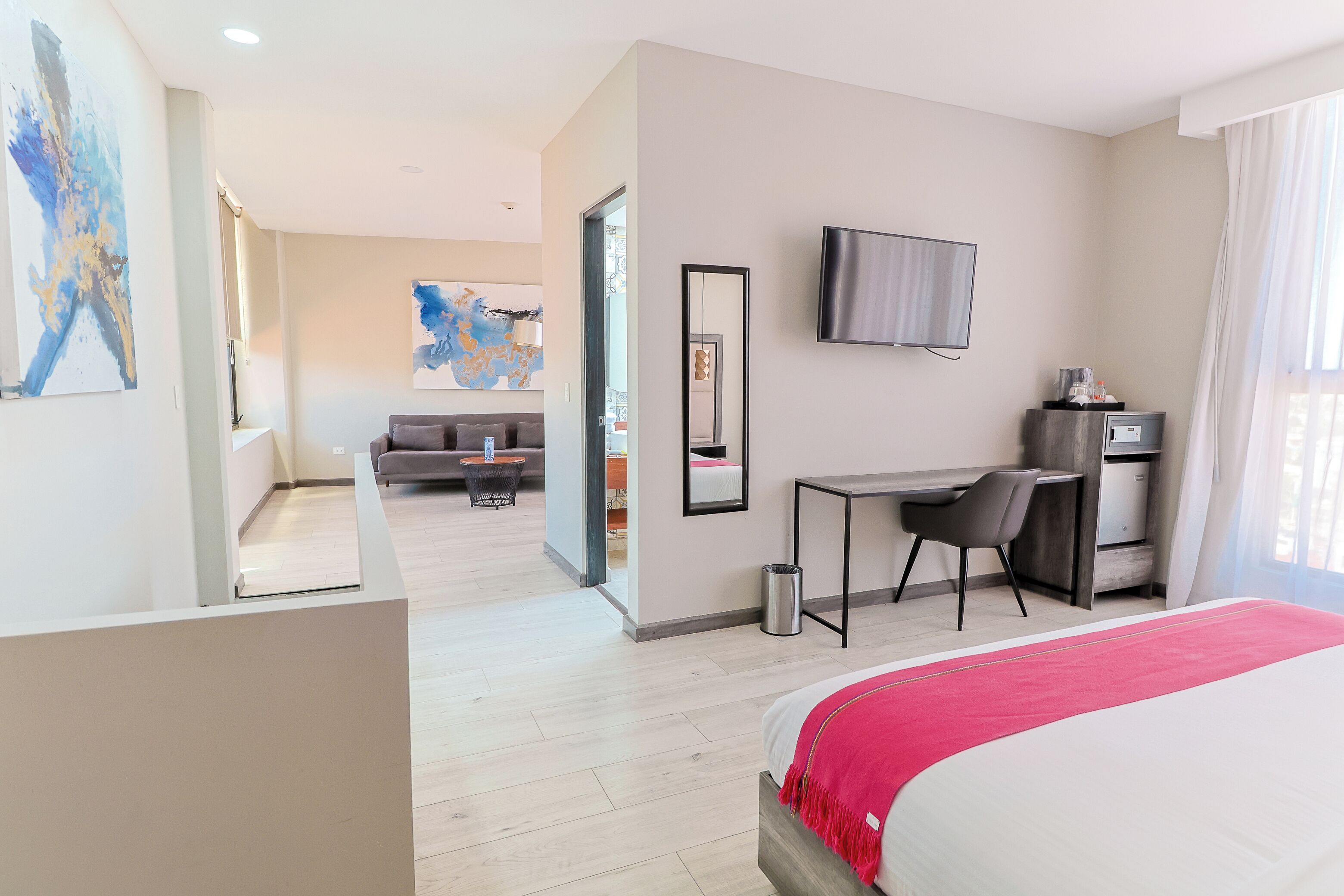 deluxe suite | desk, laptop workspace, bed sheets, wheelchair access