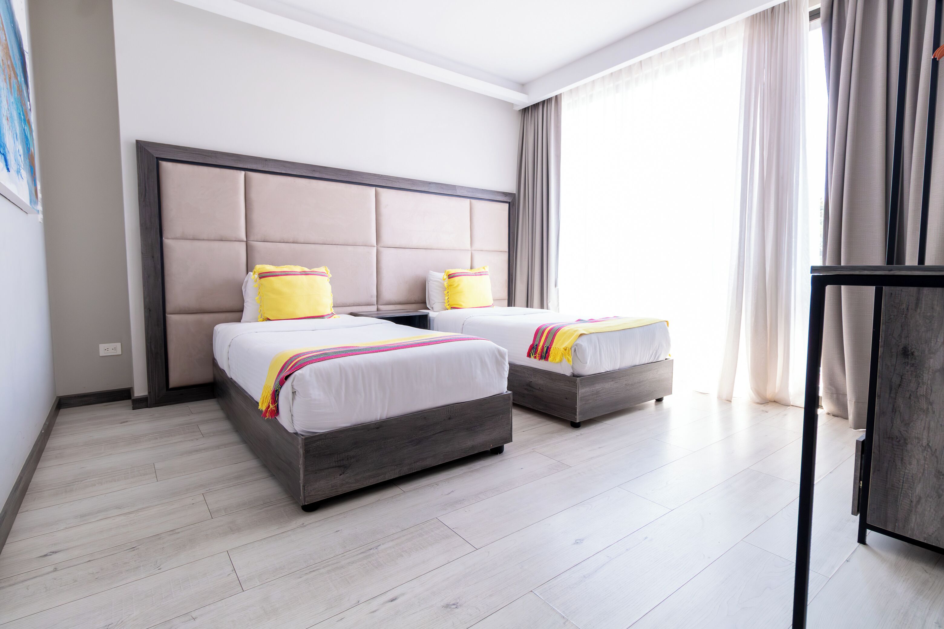 family suite | desk, laptop workspace, bed sheets, wheelchair access