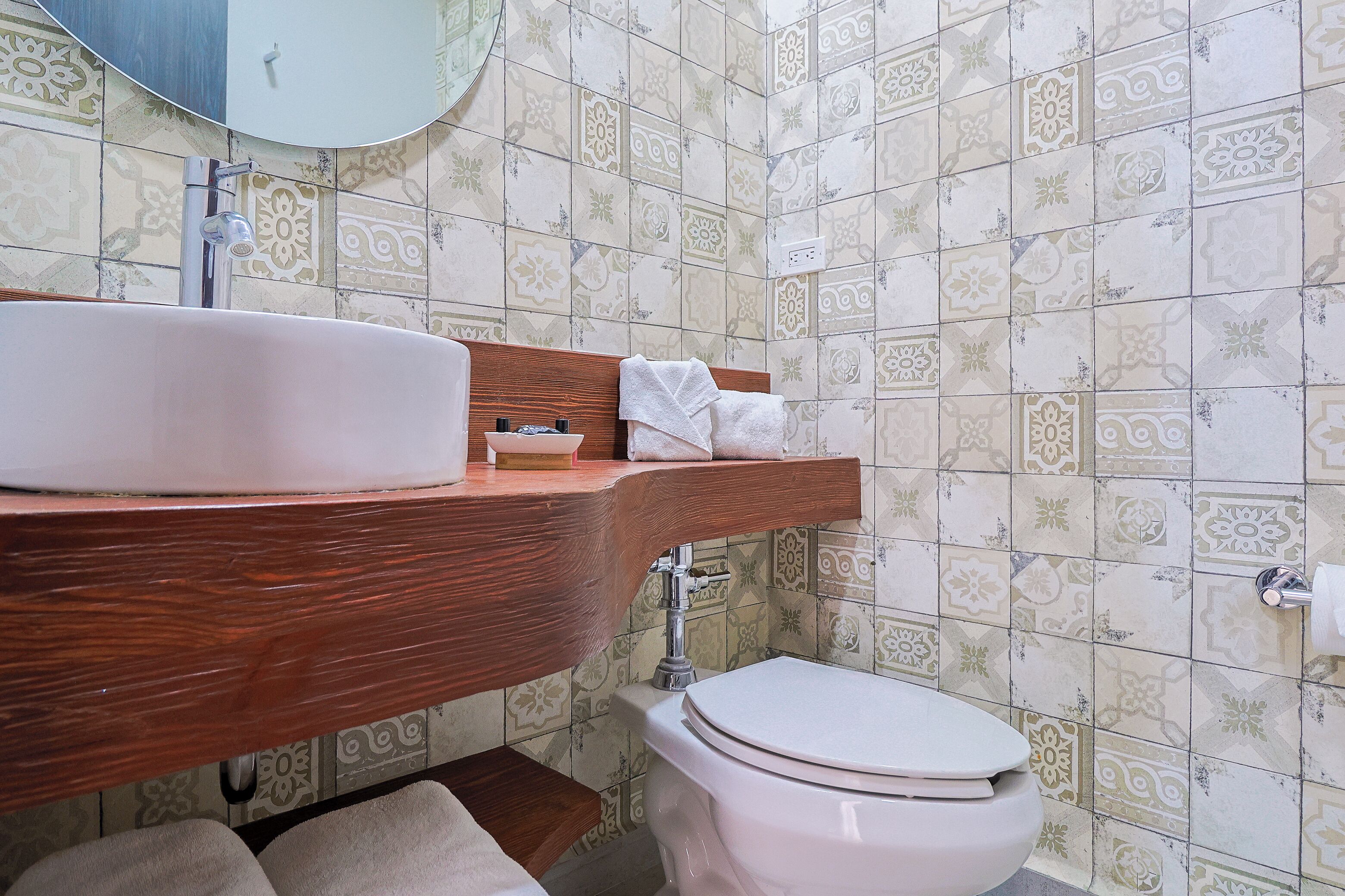 superior suite | bathroom | shower, hair dryer, towels, soap