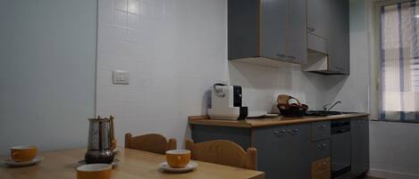 Apartment, 4 Bedrooms | Private kitchen | Fridge, microwave, oven, stovetop