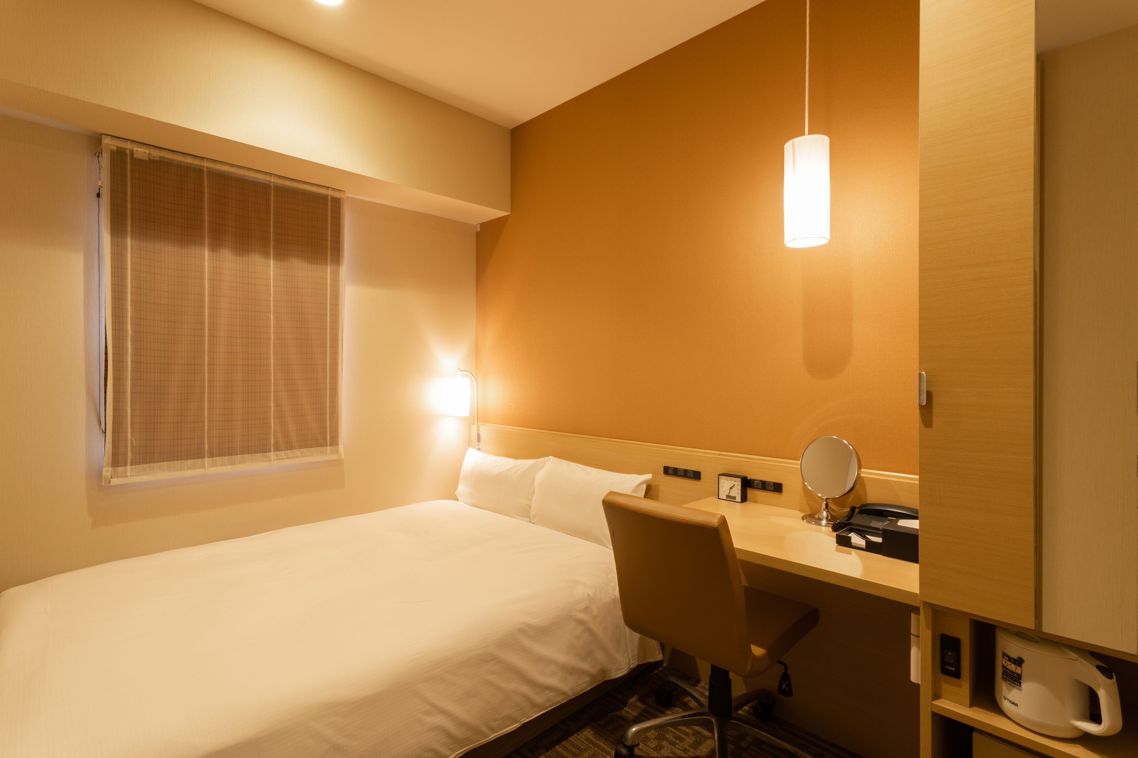 desk, laptop workspace, blackout curtains, iron/ironing board