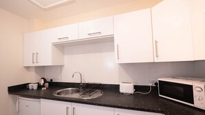 Studio | Private kitchenette | Electric kettle - Chase Suites (Cannock)