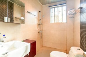 Shower, free toiletries, hair dryer, slippers