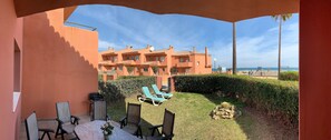 Outdoor dining - Frontline beach villa in Manilva Beach (La Chullera)