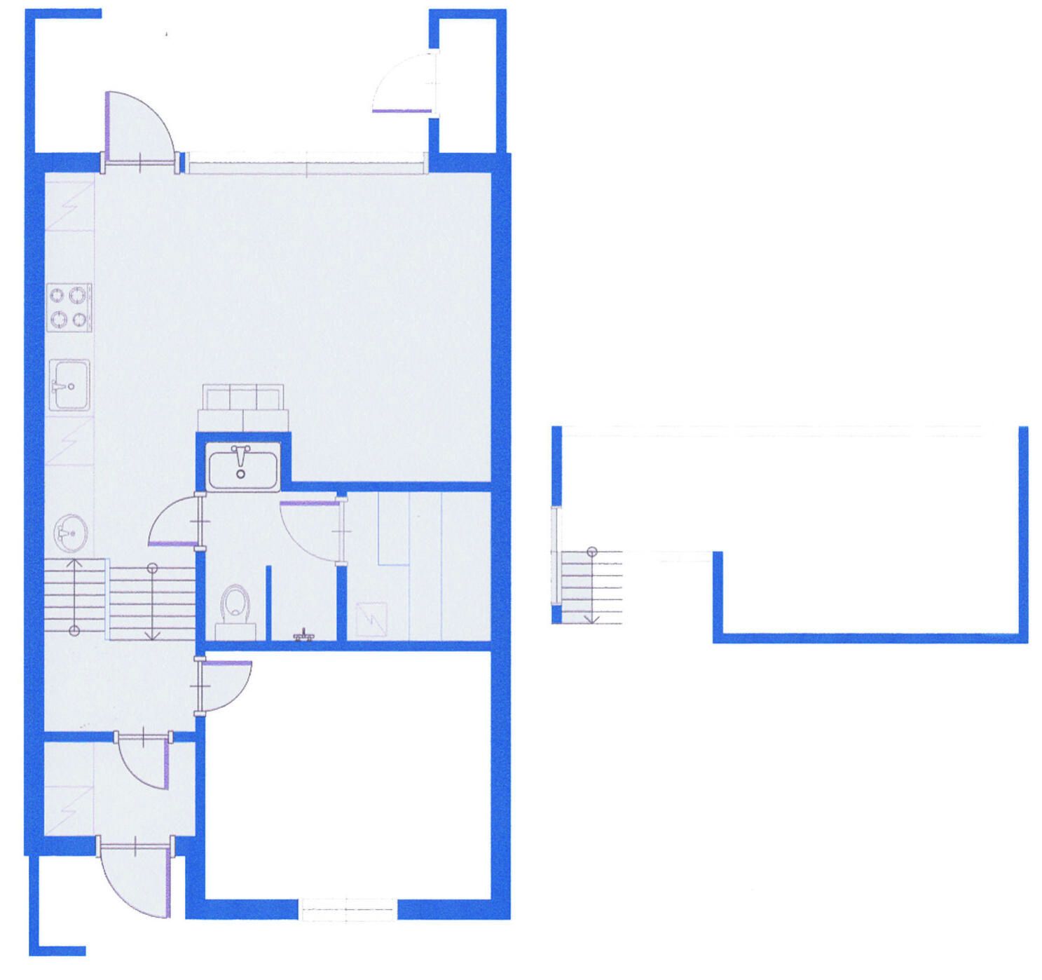 Plano de planta que muestra una cocina, comedor y dos dormitorios.