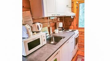 Fridge, microwave, cookware/dishes/utensils