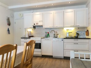 Fridge, microwave, dishwasher, cookware/dishes/utensils