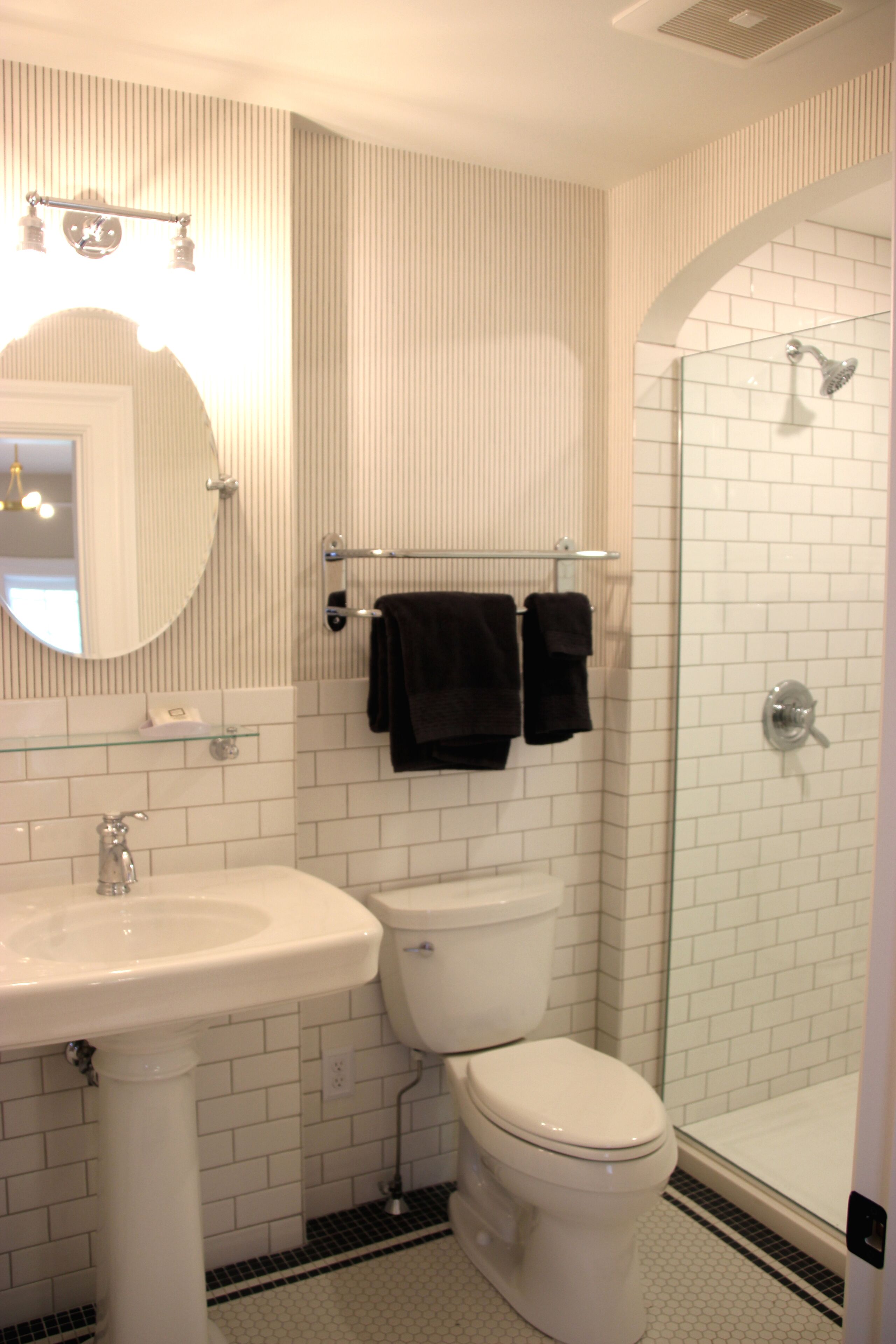 signature room | bathroom | shower, towels