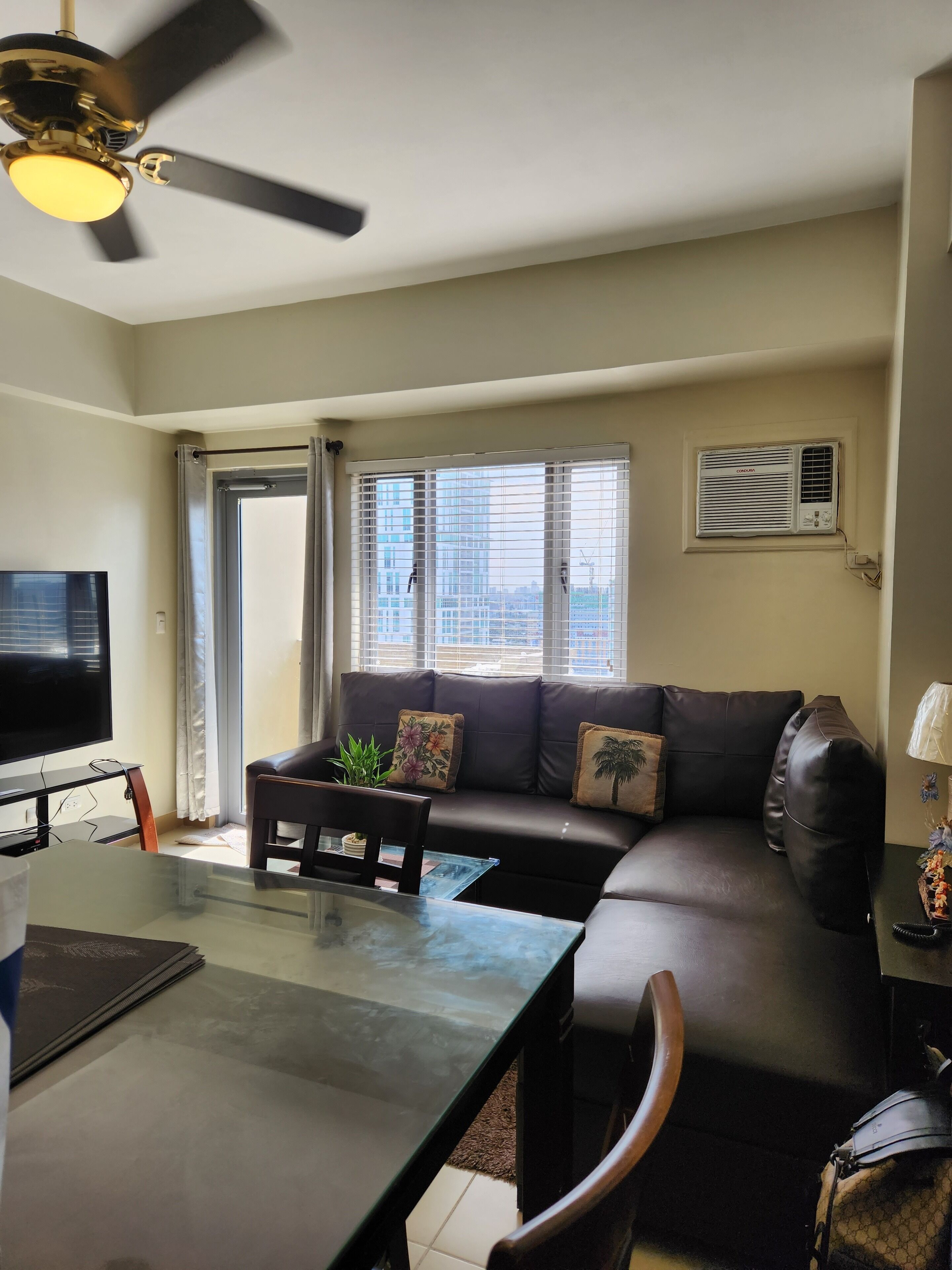 City Condo with 2 Bathroom | Living area | 37-inch flat-screen TV with cable channels, LCD TV