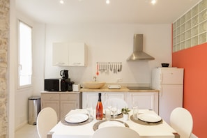 Fridge, microwave, coffee/tea maker, toaster