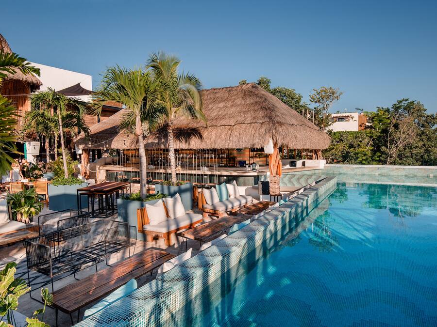 Outdoor pool, open 10:00 AM to 10:00 PM, sun loungers