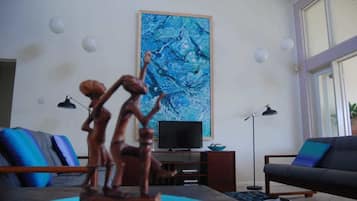 Elite Villa, 3 Bedrooms | Living area | Flat-screen TV
