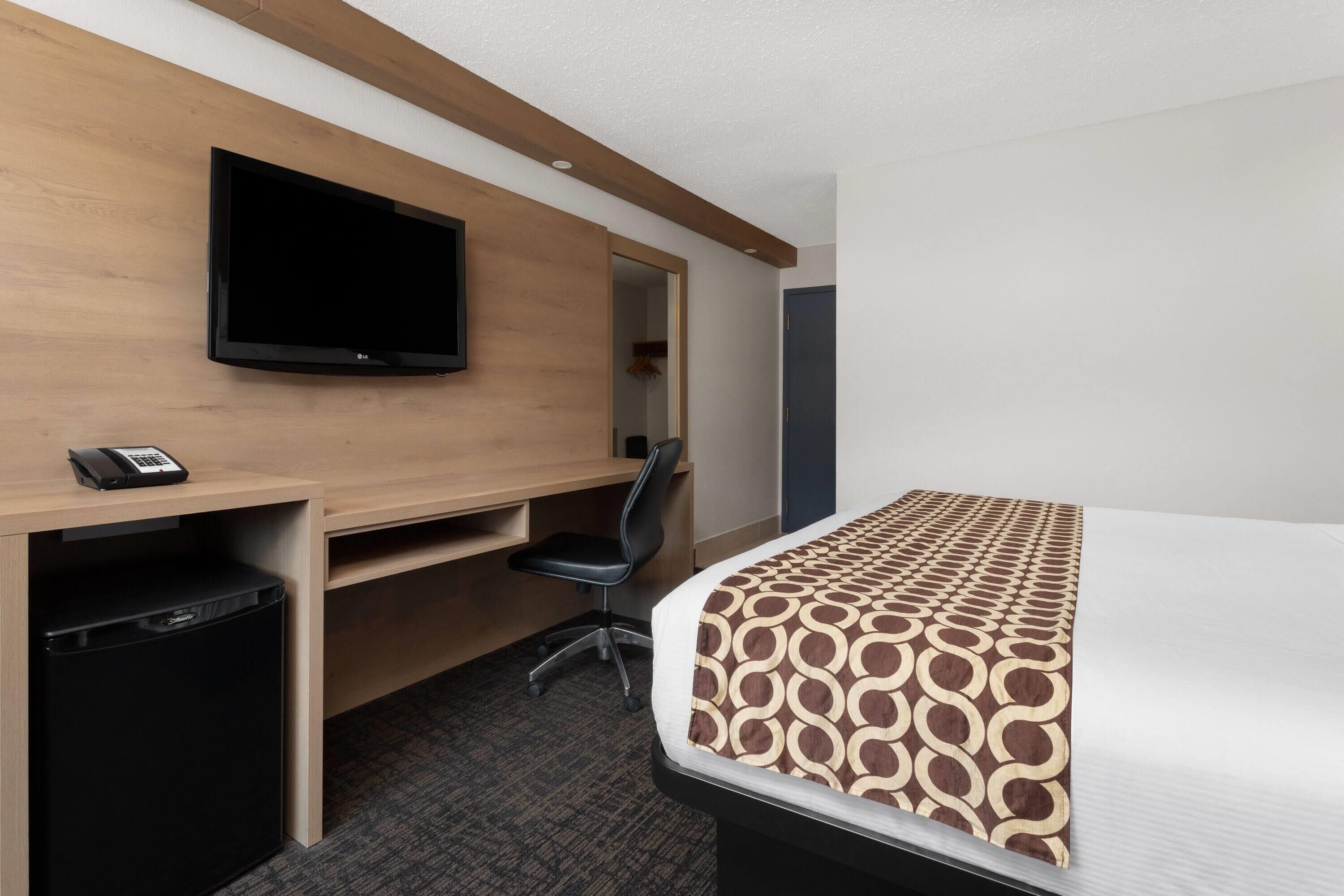 desk, laptop workspace, blackout curtains, iron/ironing board